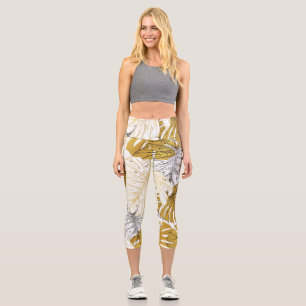 Leggings Capri Las hojas de Monstera: Blanco dorado