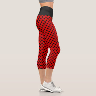 Leggings Capri Lindos lunares negros sobre rojo