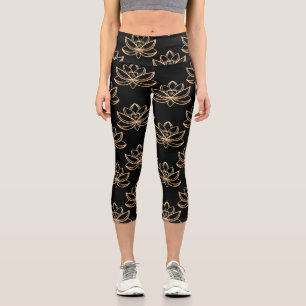 Leggings Capri Loto Dorado Disperso sobre Fondo Negro