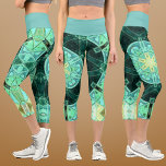 Leggings Capri Mandala Verde azulada y amarilla<br><div class="desc">Este diseño de mosaico caleidoscopio presenta brillantes azulejos verde azulados y amarillos. Un diseño geométrico vívido inspirado en fractales,  mandalas y mosaicos de cristal teñido. Consigue este hermoso diseño trippy ahora para tu amigo favorito que ama los colores brillantes!</div>