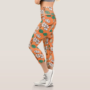 Leggings Capri Naranja de diseño floral blanca