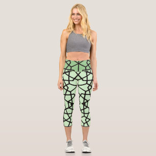 Leggings Capri Patrón abstracto de líneas negras sobre verde clar