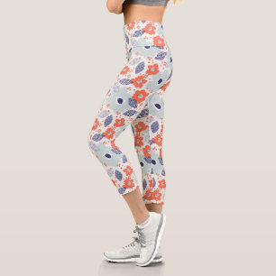 Leggings Capri Patrón de flores moderadas naranja y azul