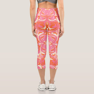 Leggings Capri Patrón giratorio en rosa, Naranja y crema
