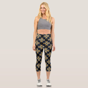 Leggings Capri Patrón interminable de estrella dorada azul