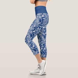 Leggings Capri Patrón repetitivo de hoja tropical blanca y azul