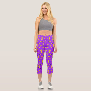 Leggings Capri Pequeño girasol sobre fondo violeta brillante