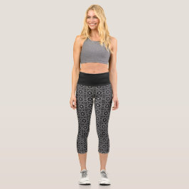 Leggings Capri Piernas Capri negras con patrón geométrico