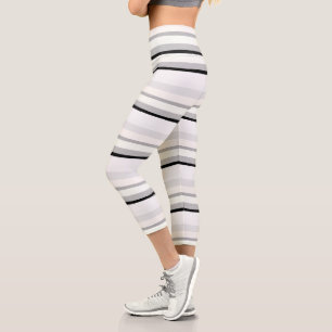 Leggings Capri Rayas abstractas en negro, blanco y verde