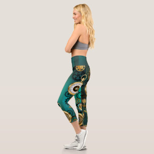 Leggings Capri Steampunk Jewelry Watch sobre un fondo verde