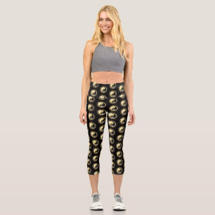 Leggings Capri Yin Yang dorado en negro