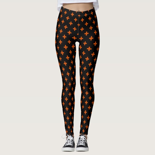 Leggings Cruces de polka naranja sobre negro (Anverso)