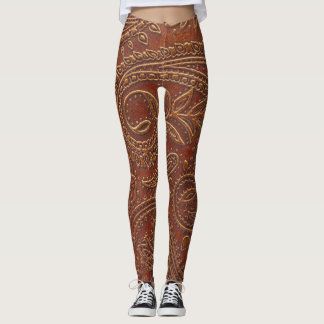 Leggings Cuero marrón, patrón floral instrumentado.