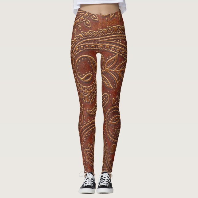 Leggings Cuero marrón, patrón floral instrumentado. (Anverso)