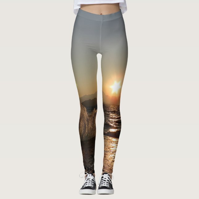 Leggings die Wellen vom Meer prallen gegen einen Anlegesteg (Anverso)