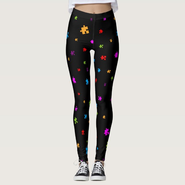 Leggings El autismo rompe las piezas en negro (Anverso)