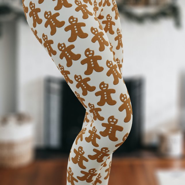 Leggings Festividad del patrón hombre de pan de jengibre (A fun and festive gingerbread man pattern leggings with Christmas Cookies floating on a milky cream)