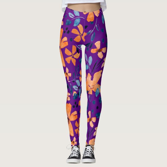 Leggings Flor naranja y hojas azules en transparente (Anverso)