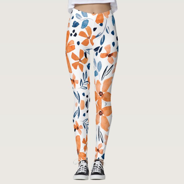 Leggings Flor naranja y patrón de hojas azules (Anverso)