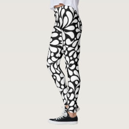 Leggings Flores blancas modernas y audaces sobre fondo negr