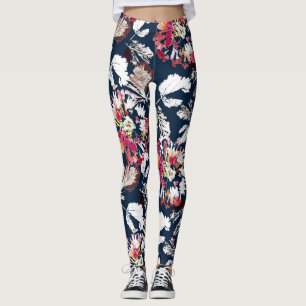 Leggings Flores rojas y blancas en azul.