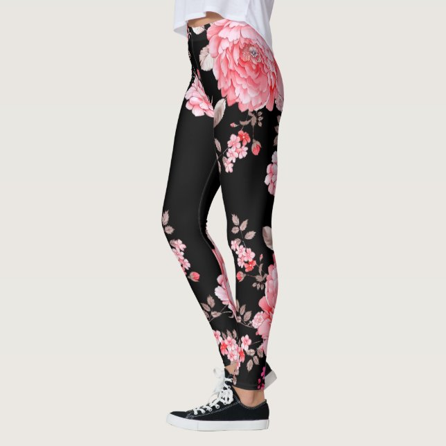 Leggings Flores rosas con la leyenda de fondo negra. (Izquierda)