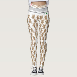 Leggings fondo blanco con flores marrones sobre él