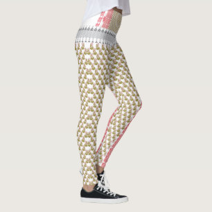 Leggings fondo blanco con hojas verdes sobre él