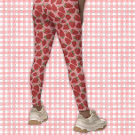 Leggings Fresas rojas maduras con patrones rosados<br><div class="desc">Añade un color delicioso a tu ropa con estas leggings estampadas. Este diseño parece casi lo suficientemente bueno para comer con mis ilustraciones realistas de fresas rojas jugosas y maduras colocadas sobre un fondo rosa bonito. Los gráficos frutales se representan en tonos rojos y rojos con hojas verdes. Esta hermosa...</div>