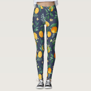 Leggings Fusión cítrica: Naranjas con flores tropicales
