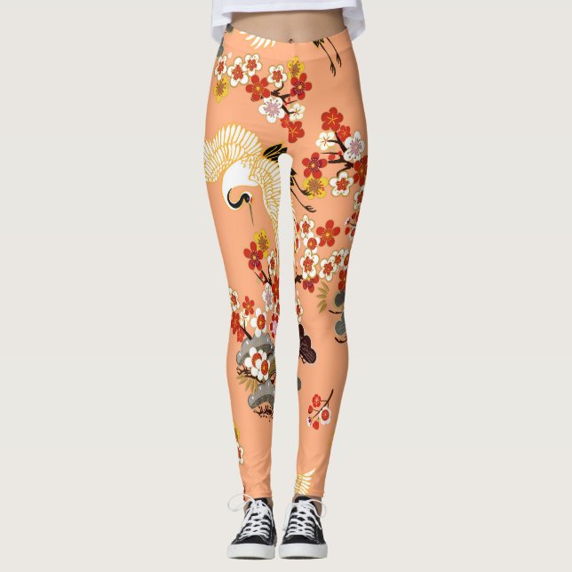 Leggings Grullas, sakura, coloridas, florales, cantaloupe. (Anverso)