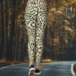 Leggings Impresión de Safari de Cream Leopard<br><div class="desc">Las leggings con huellas de leopardo de Safari Cream son una opción audaz y de moda, con un Creambackground vívido y un intrincado patrón de impresión de leopardo. La combinación única del llamativo color crema y la clásica huella de leopardo crea una fascinante fusión de estética moderna y animalista. Estas...</div>