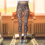 Leggings Impresión de Safari Marrón Exótico<br><div class="desc">Las leggings de huellas de tigre son una opción atrevida y de moda con un fondo marrón vívido y un intrincado patrón de impresión de leopardo. La combinación única del llamativo color marrón y la clásica huella de leopardo crea una fascinante fusión de estética moderna y animalista. Estas leggings son...</div>