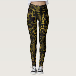 Leggings Jeroglíficos antiguos egipcios del oro en negro