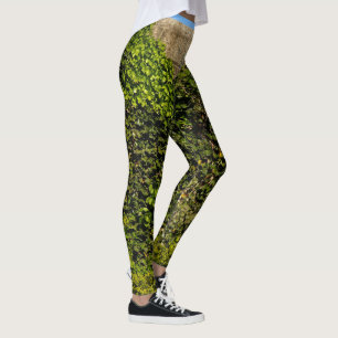 Leggings La hiedra cubrió la pared de piedra con las