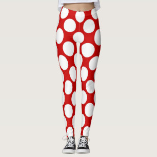 Leggings La polka blanca se pega sobre un fondo rojo