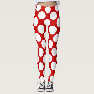Leggings La polka blanca se pega sobre un fondo rojo