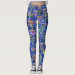 Leggings Moda Oro Azul Menorah Estrella de David Hanukkkah<br><div class="desc">Estas leggings de vacaciones presentan un patrón de moda de oro,  menorá verde y púrpura y Estrella de David dorada en un fondo azul. Diseñado por el mundialmente reconocido artista Tim Coffey.</div>