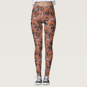 Leggings Naranja acuarela y flores marrones.