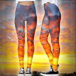 Leggings Naranja  atrevido moderno nubes amarillas foto mod<br><div class="desc">¡Sé un protagonista en estas magníficas leggings fotográficas de una brillante puesta de sol de nubes azules, amarillas y de acero y naranja! Trabajar, hacer recados, o simplemente pasar el rato. Tan único que nunca tendrás que preocuparte por las copias! Añada una sólida tapa negra para lo último en sofisticación...</div>