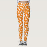 Leggings Naranja Ghost Halloween<br><div class="desc">Montones de pequeños fantasmas blancos sobre un fondo naranja. Un patrón divertido para los que les gustan las cosas lindas y aterradoras. Particularmente divertido para Halloween. Arte original de Nic Squirrell.</div>