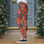 Leggings Navidades de Poinsettia<br><div class="desc">Patrón de nosettia con color de fondo personalizado. Sería genial agregarle a su horrible conjunto de suéter. Completa el aspecto con algunos aretes de árboles de navidad :)</div>