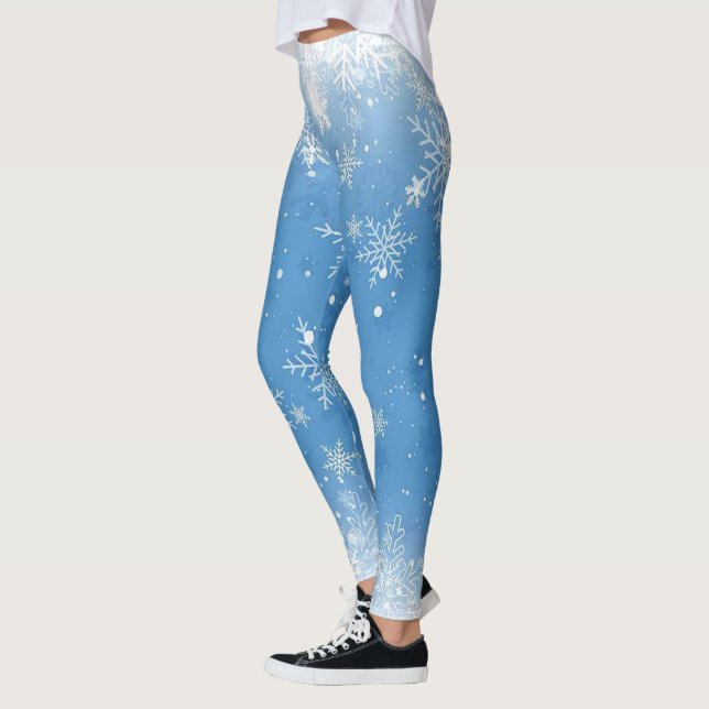 Leggings Navidades lanzan copos de nieve en azul (Izquierda)