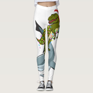 Leggings Navidades T-rex con luces navideñas montando un g