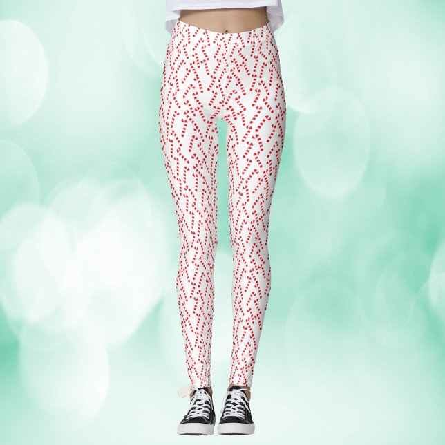 Leggings Patrón blanco rojo de canto (A pair of leggings with a red and white candy cane pattern)