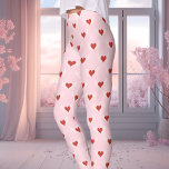 Leggings Patrón Cardíaco Aquido El día de San Valentín Rosa<br><div class="desc">Estas encantadoras leyendas El día de San Valentín muestran un patrón único de corazones alados en rojo, ambientados con un suave fondo rosado. Perfecto para añadir un toque de romance a tu ropa, estas leggings son ideales para celebrar el amor, ya sea El día de San Valentín o cualquier día...</div>