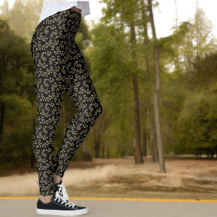 Leggings Patrón de hoja verde sobre negro