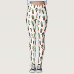Leggings Patrón de Navidades de plantas de Santa<br><div class="desc">Patrón con ilustraciones de macetas de plantas,  incluyendo aloe,  cactus y palmera,  decorados con adornos navideños que incluyen ornamentos,  arcos,  sombrero de santa,  luces y estrellas.</div>