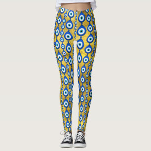 Leggings Patrón de ojos malvados en textura dorada