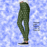 Leggings Patrón de símbolo feminista verde oscuro<br><div class="desc">Estas leggings son de color verde oscuro,  con un patrón repetido en blanco brillante. El patrón se deriva del símbolo de venus,  una declaración sutil en apoyo de las mujeres. Esto sería un regalo encantador para navidades o cumpleaños.</div>
